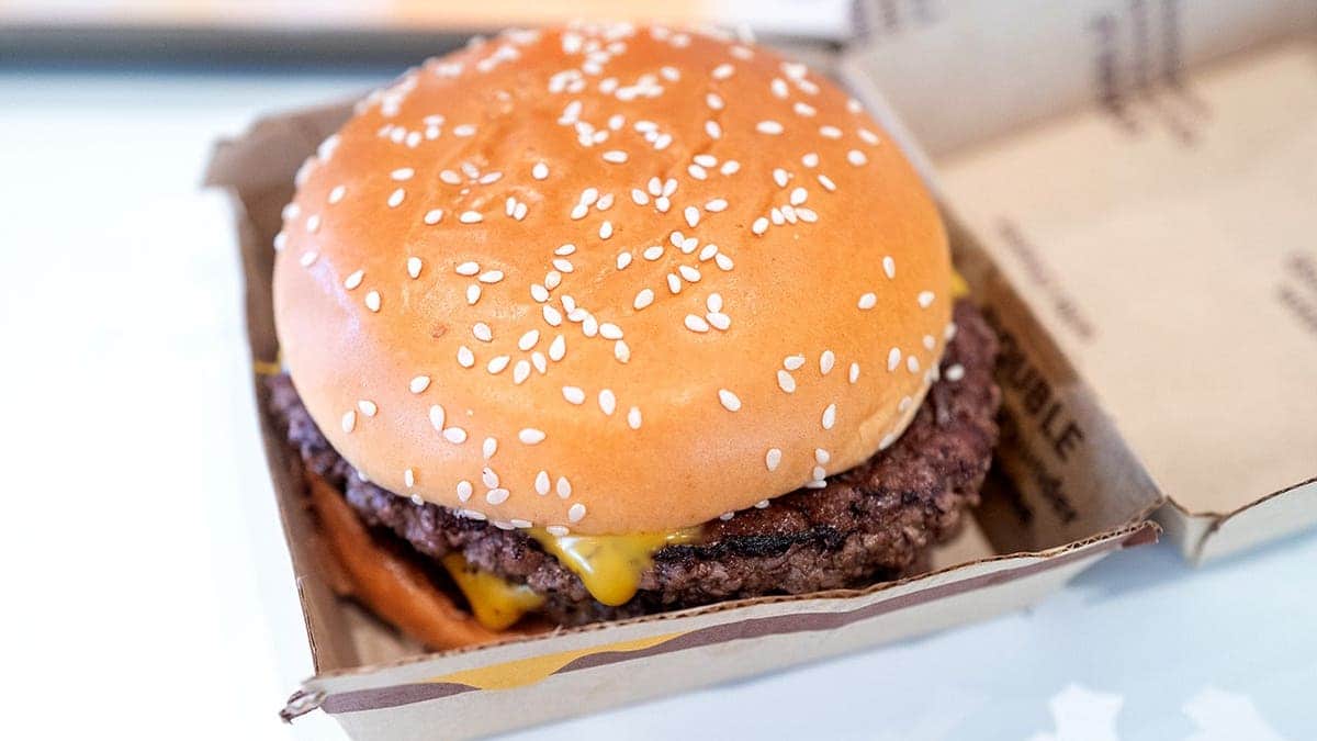 Close-up of McDonald's double quarter pounder with cheese in box