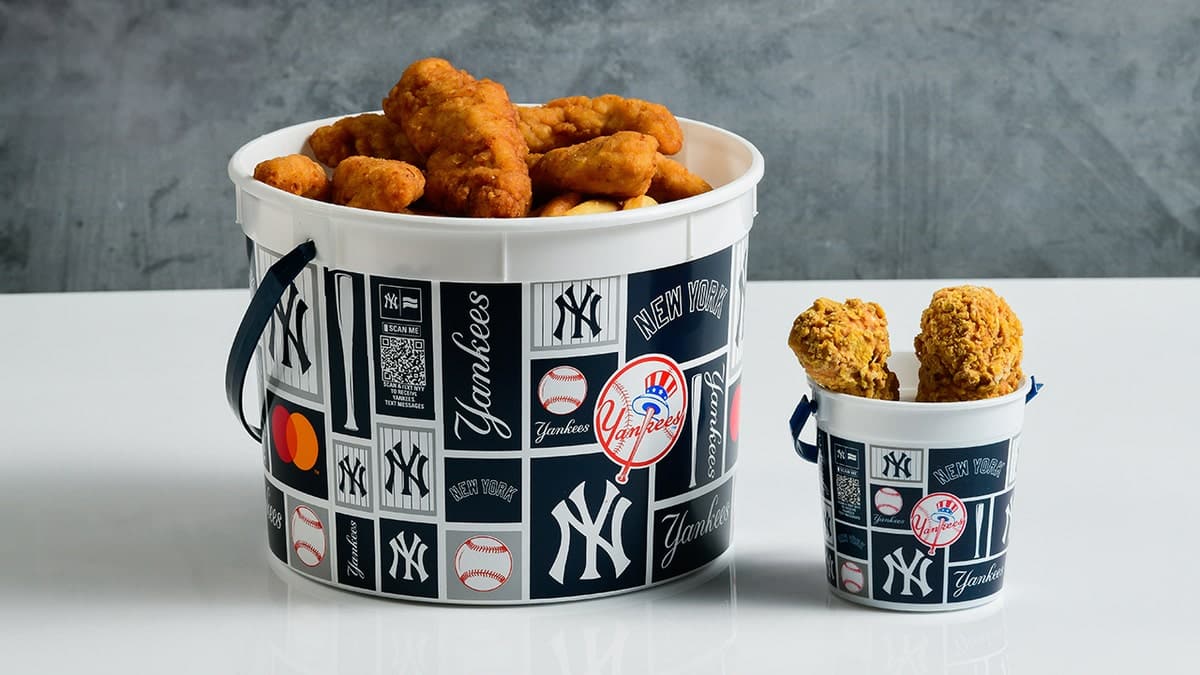 A traditional chicken bucket sits alongside the Yankees’ viral ice cream version, highlighting the dessert’s striking resemblance to the real thing.
