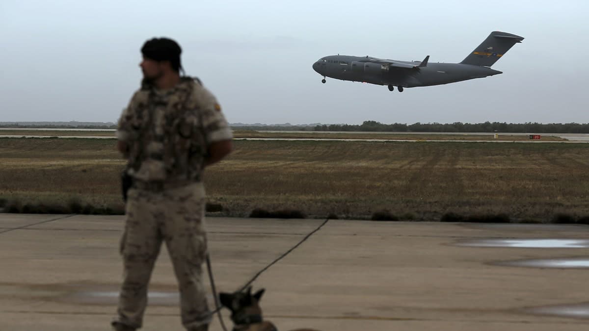 U.S. Air Force plane flying before landing at Moron military airbase in southern Spain