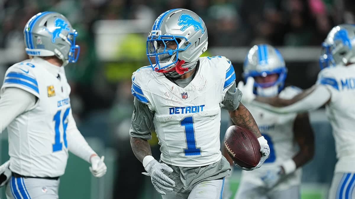 Detroit Lions wide receiver Jameson Williams celebrating a touchdown in a football game.