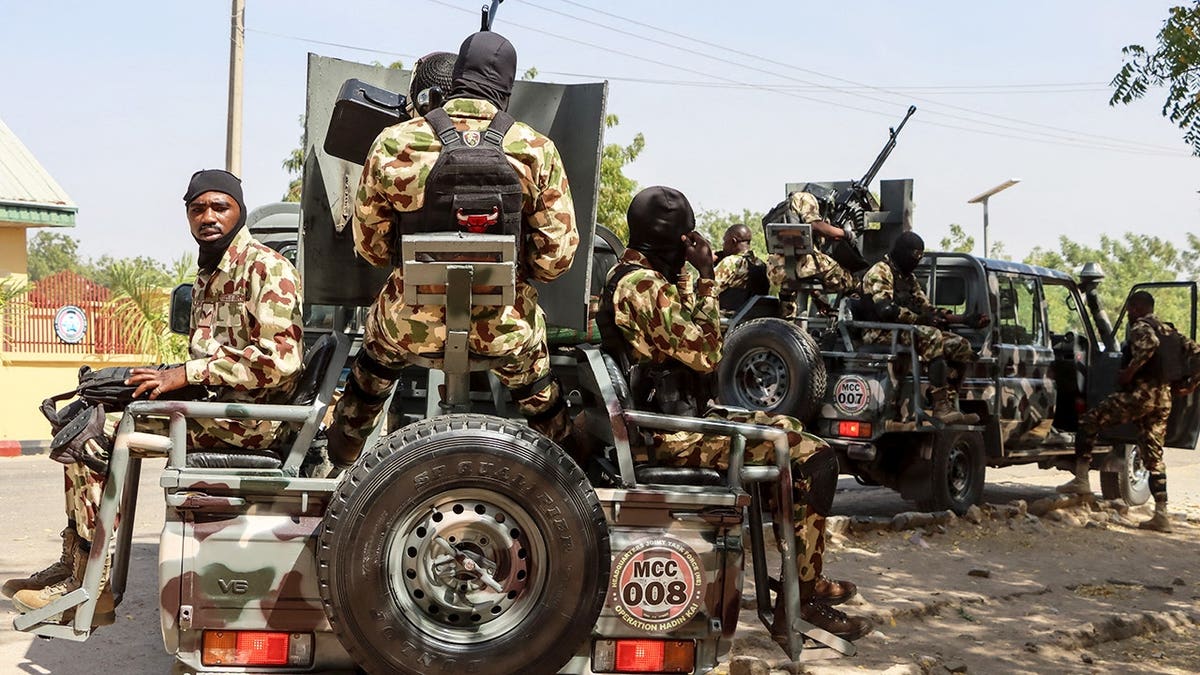 Nigerian soldiers preparing to patrol at Headquarters Theatre Command Joint Task Force in Maiduguri