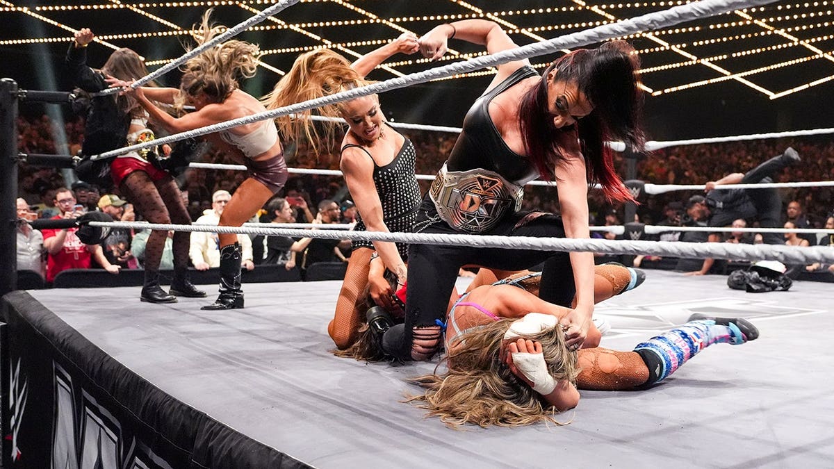 Lainey Reid and Jacy Jayne wrestling Kendal Grey and Lola Vice in a ring