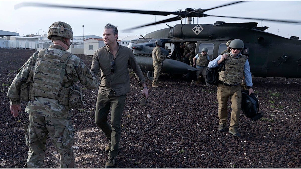 War Secretary Pete Hegseth shaking hands with an American airman during a CENTCOM visit