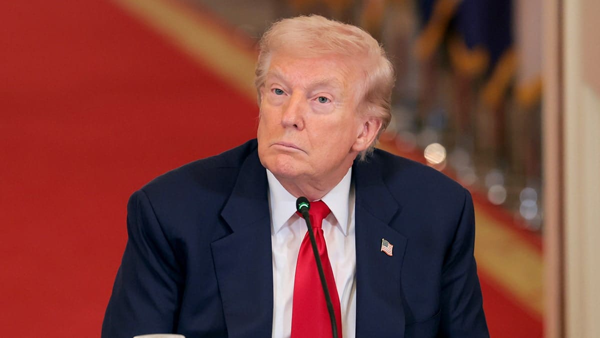 President Donald Trump looking on during a roundtable discussion in the White House East Room
