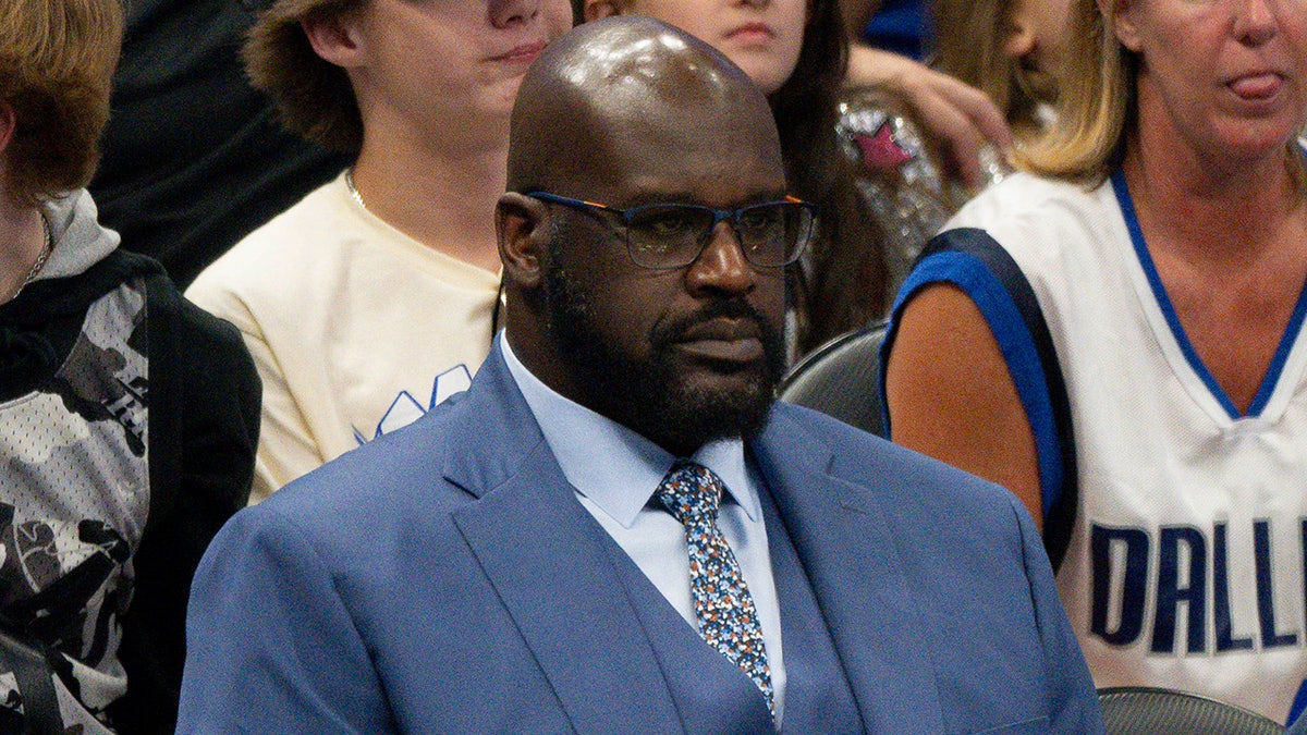 Shaquille O'Neal watching the Dallas Mavericks versus Minnesota Timberwolves game at American Airlines Center