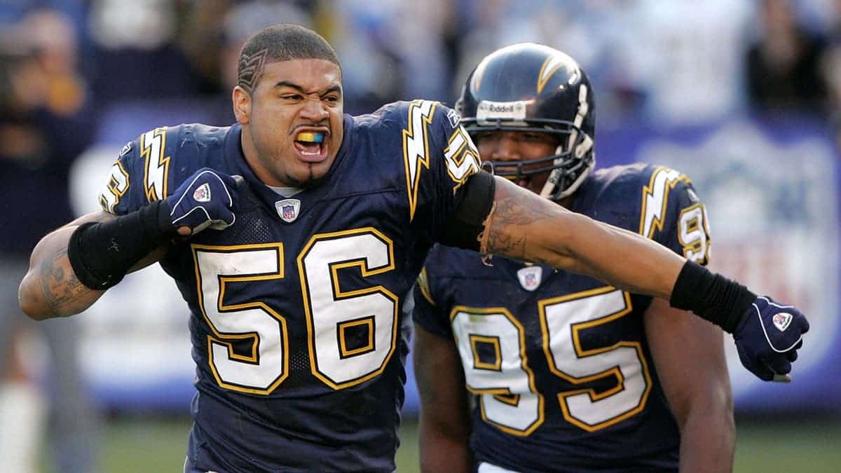 San Diego Chargers linebacker Shawne Merriman celebrating a big hit during a game.