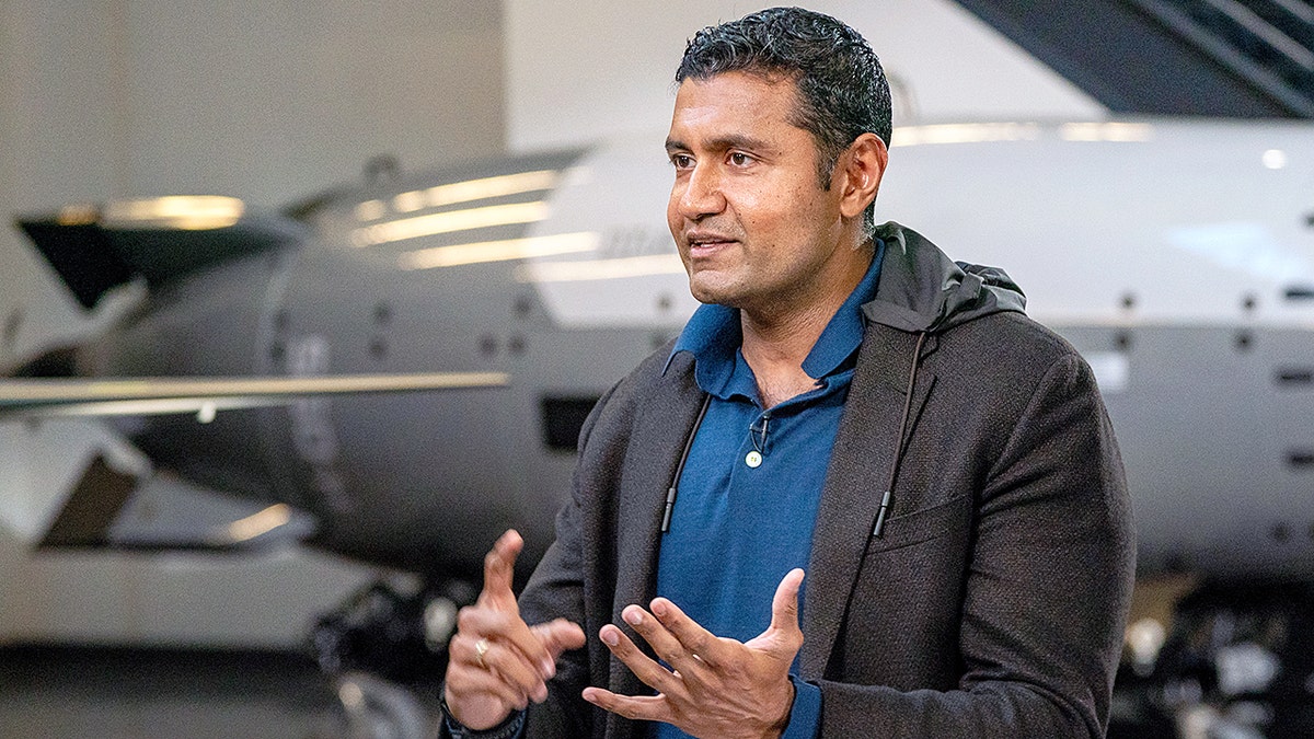 Shyam Sankar seated during a Bloomberg Tech interview at Anduril's headquarters.