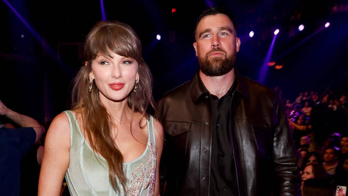 Taylor Swift and Travis Kelce attend an awards show