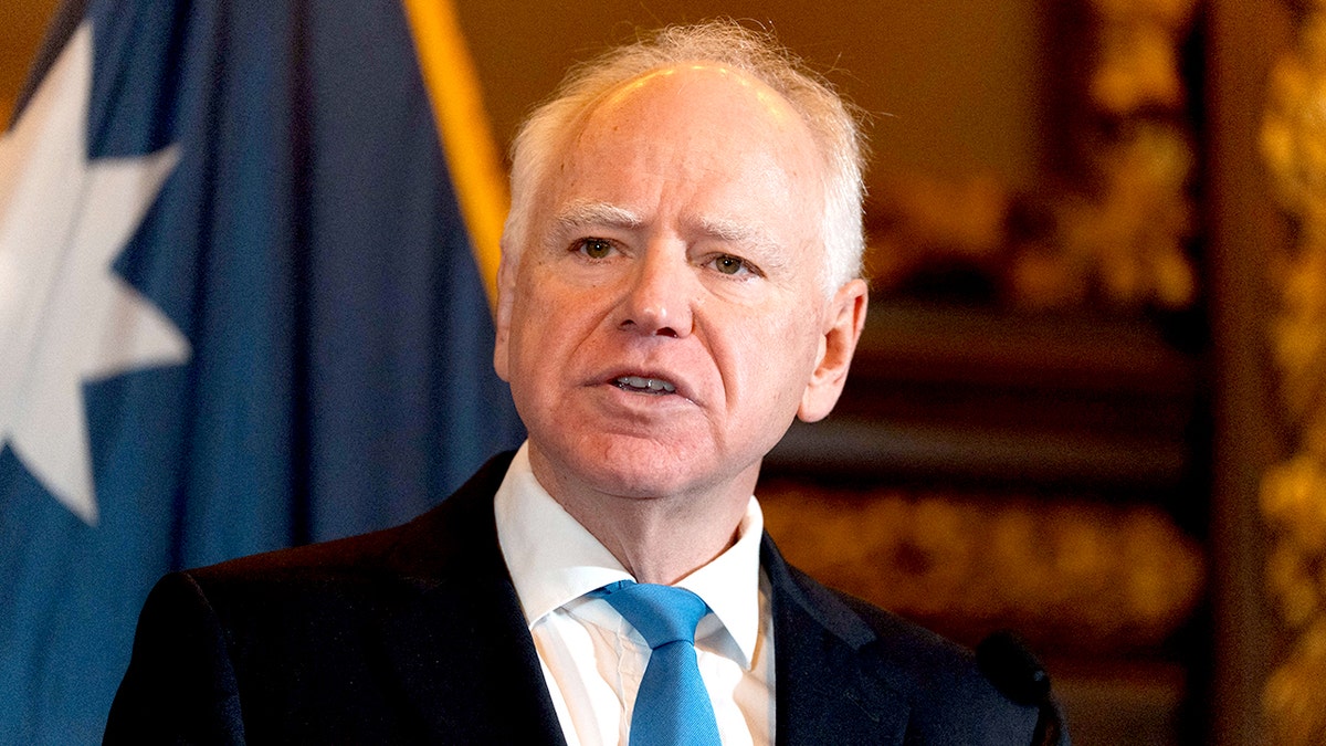 Democratic Minnesota Governor Tim Walz speaking to reporters at the Minnesota State Capitol in St. Paul