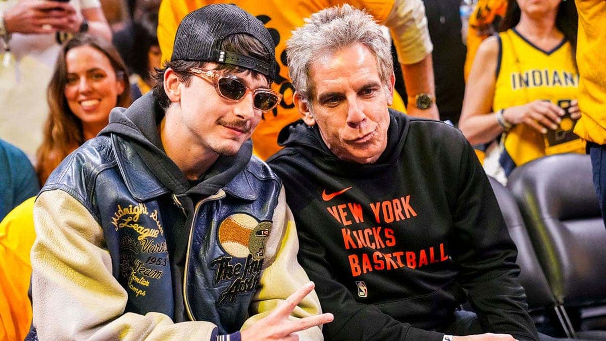 Actors Timothée Chalamet and Ben Stiller posing together at Gainbridge Fieldhouse in Indianapolis
