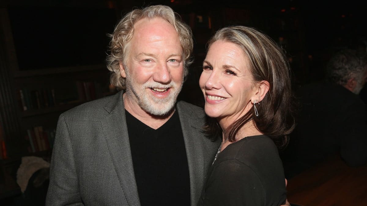 Timothy Busfield and Melissa Gilbert posing together at an event