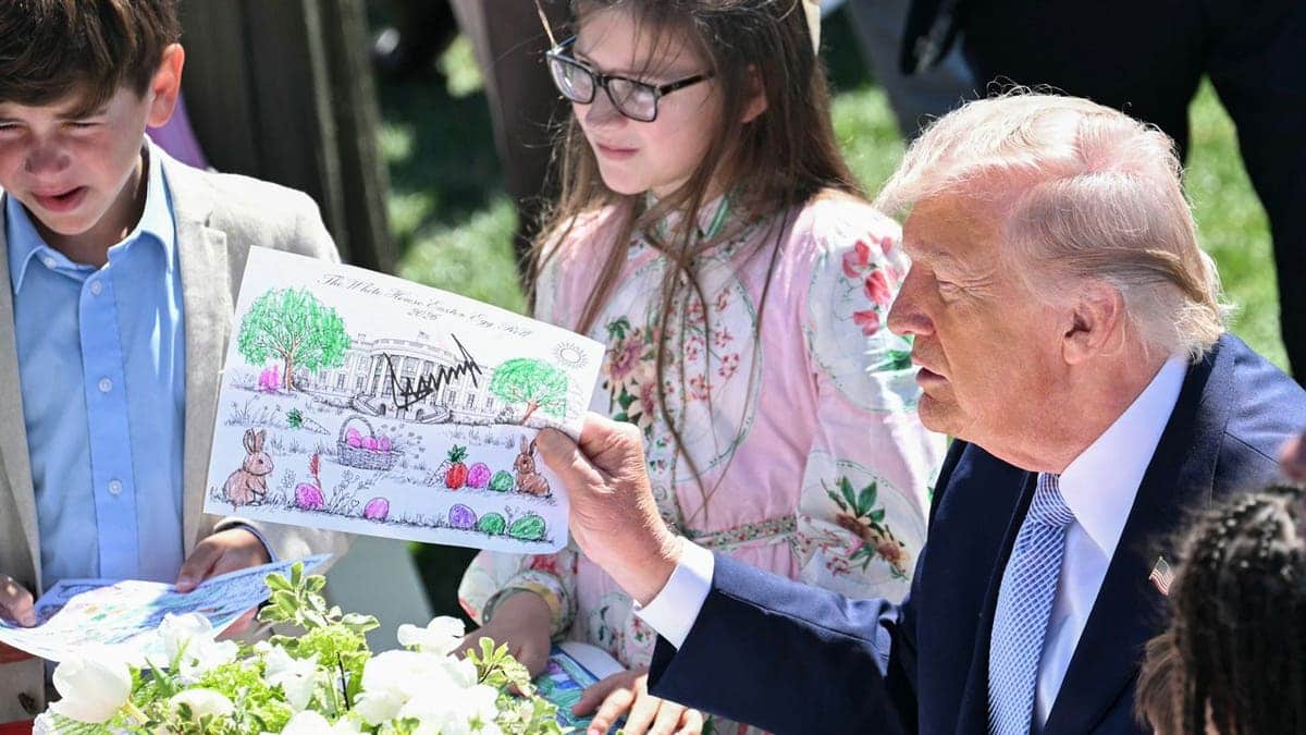 trump colors with children at white house egg roll