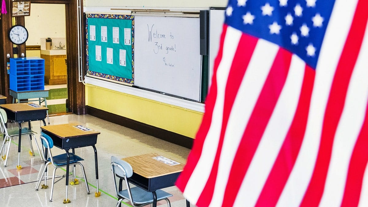 An American flag hanging in a classroom at a Catholic elementary school in Brookline, Massachusetts