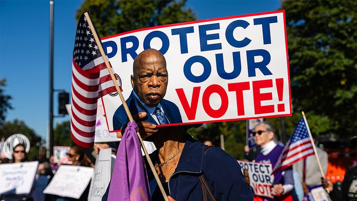 Demonstrators holding signs outside the U.S. Supreme Court building in Washington, D.C.