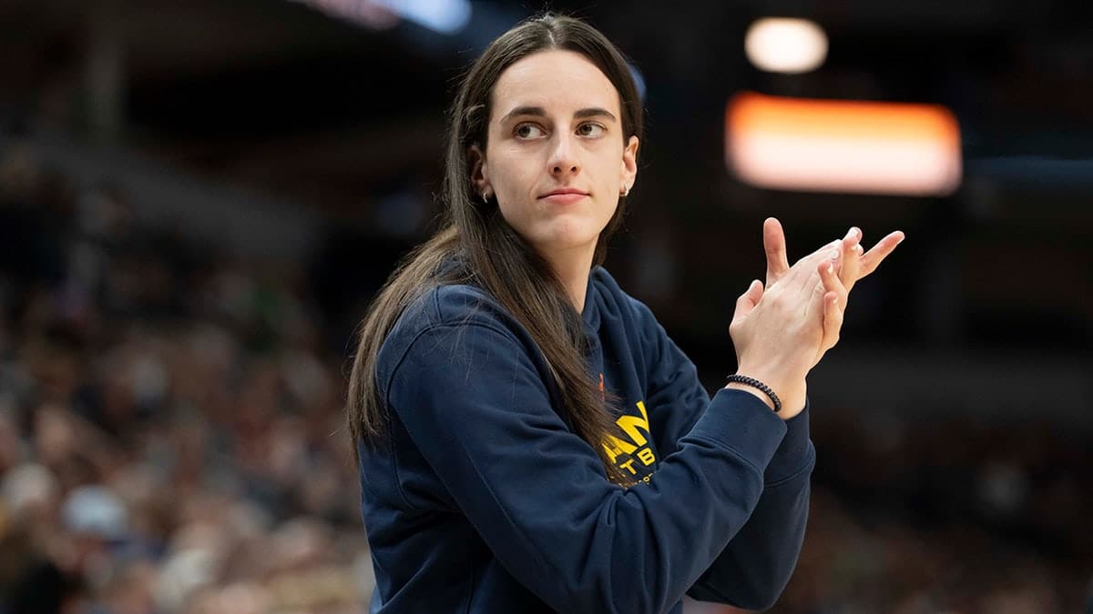 Indiana Fever guard Caitlin Clark looking on during a basketball game at Target Center