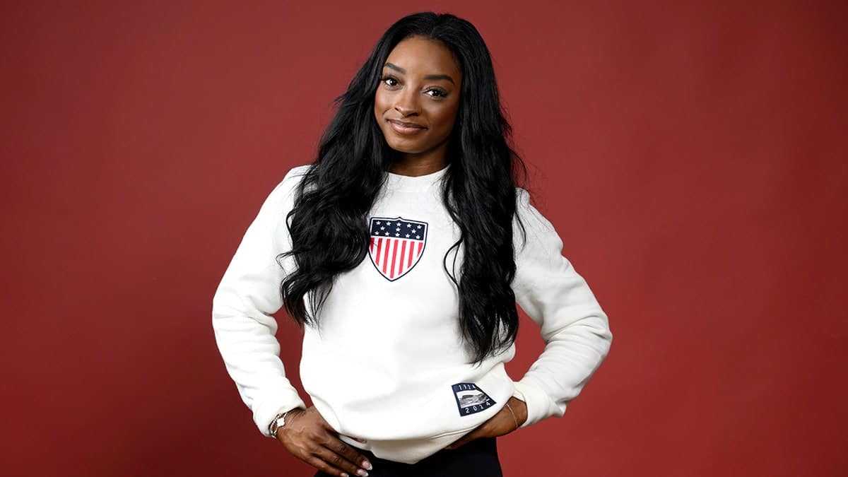 Olympian Simone Biles posing on the Today Show set in Paris