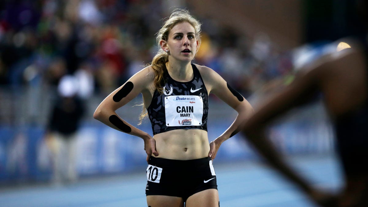 Mary Cain walking off track after 1500-meter run at Drake Relays