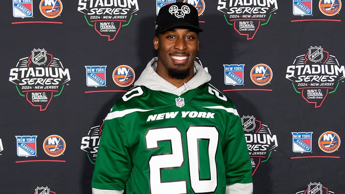 Breece Hall of the New York Jets standing on the step and repeat at MetLife Stadium