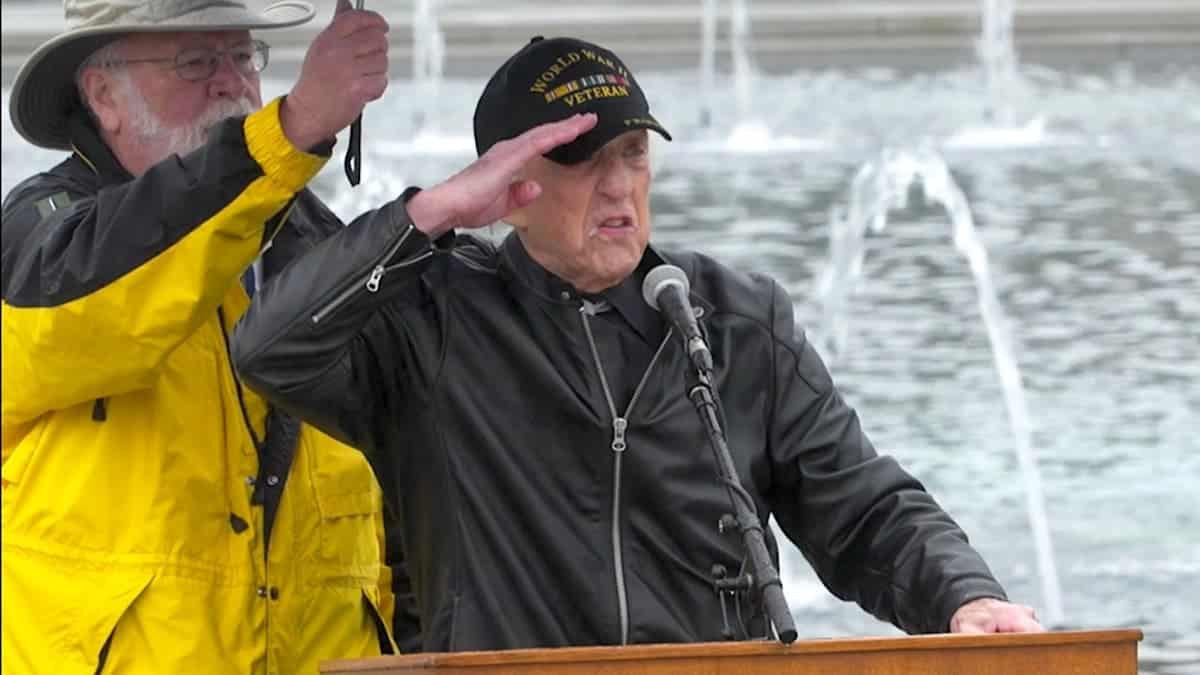 david yoho, 97, stands and salutes with his voice cracking