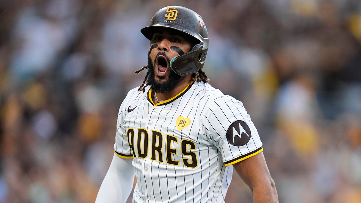 San Diego Padres' Fernando Tatis Jr. celebrating after hitting a home run during a baseball game