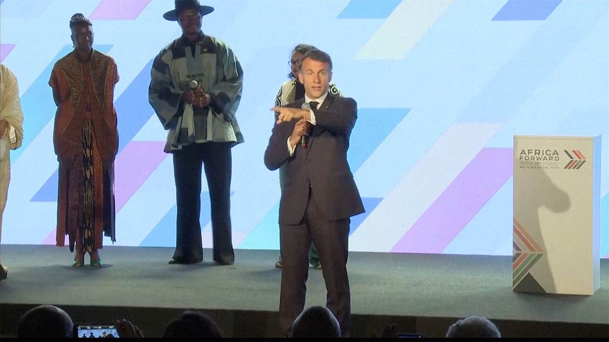 Emmanuel Macron stops a session at the Africa Forward Summit