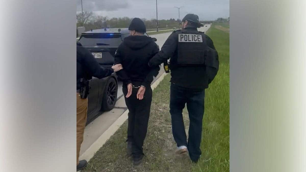 suspect seen in handcuffs by Milwaukee PD