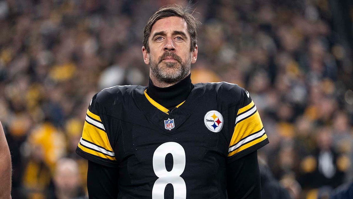 Aaron Rodgers of the Pittsburgh Steelers standing during the national anthem at Acrisure Stadium
