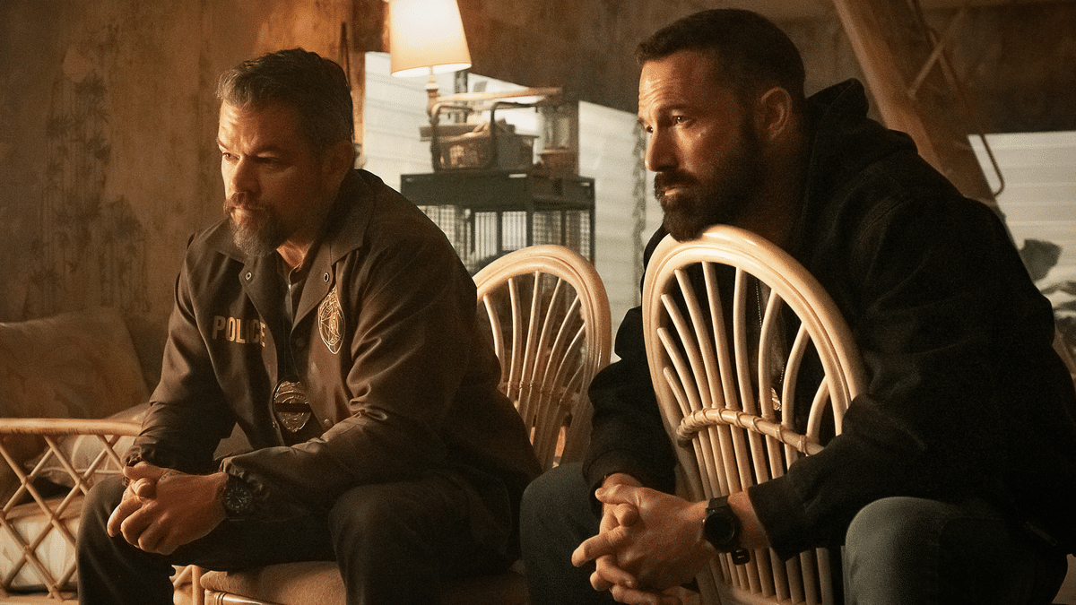 Ben Affleck and Matt Damon sitting on set as Miami narcotics investigators in