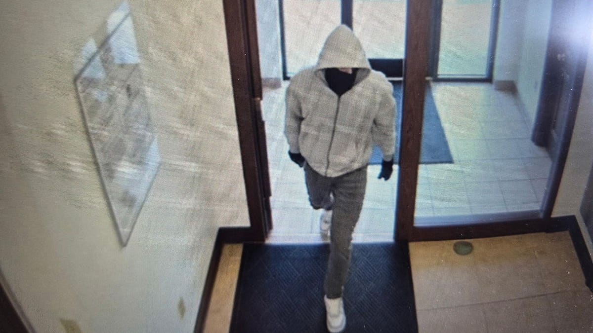 An image of a suspect wanted in connection with a deadly bank shooting in Berea