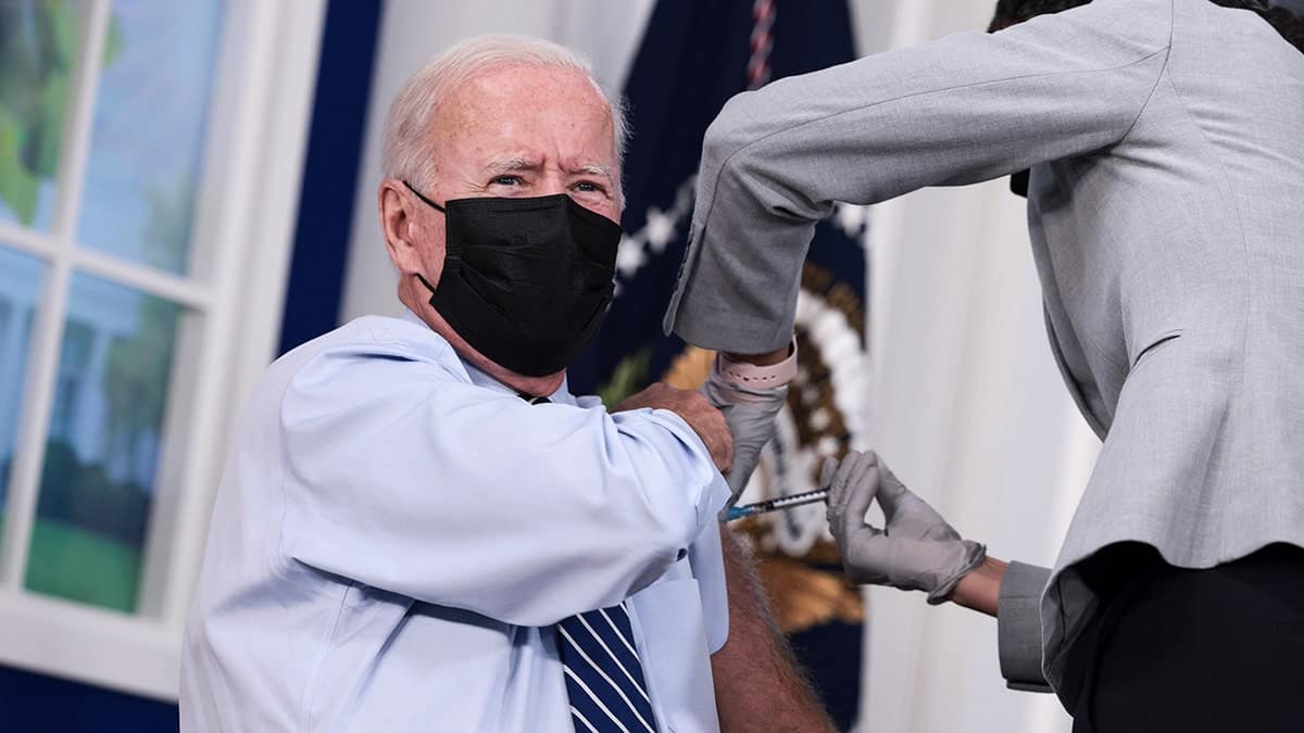 President Joe Biden receiving a third dose of Pfizer Covid-19 vaccine at the White House