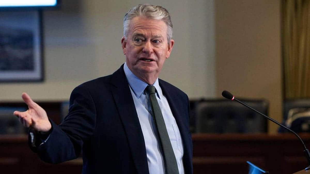 Idaho Gov. Brad Little speaking at a podium