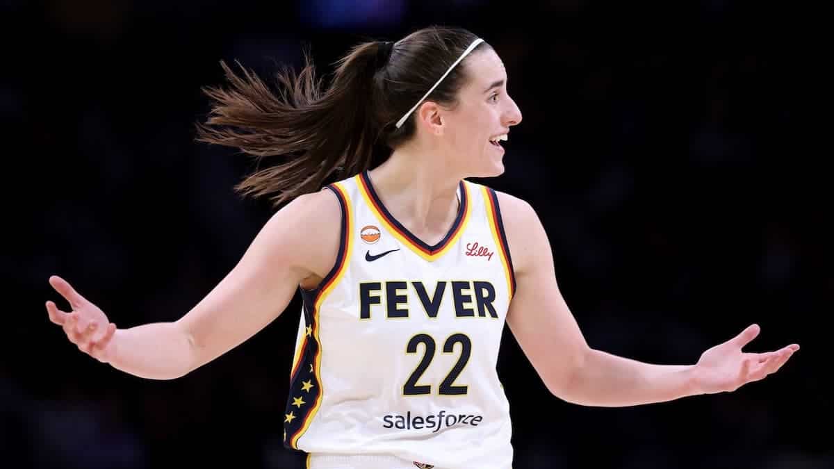 Caitlin Clark arguing for a foul during a basketball game at Crypto.com Arena