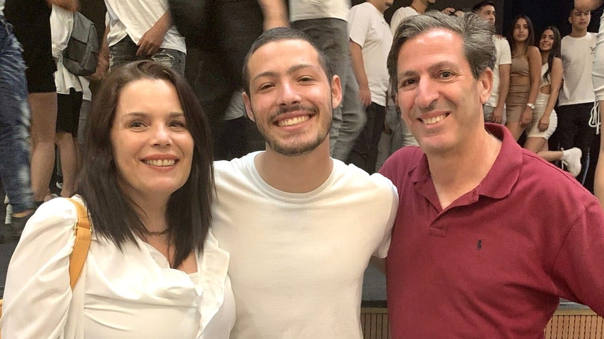 Itay Chen with his mother Hagit Chen (left) and father Ruby Chen (right)
