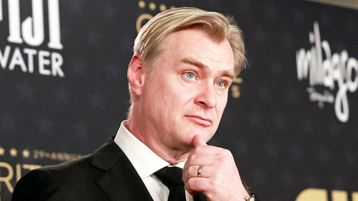 British director Christopher Nolan speaking to journalists at the Critics Choice Awards press room
