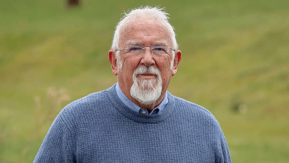 Retired pastor Clive Johnston preaching near Causeway Hospital in Coleraine