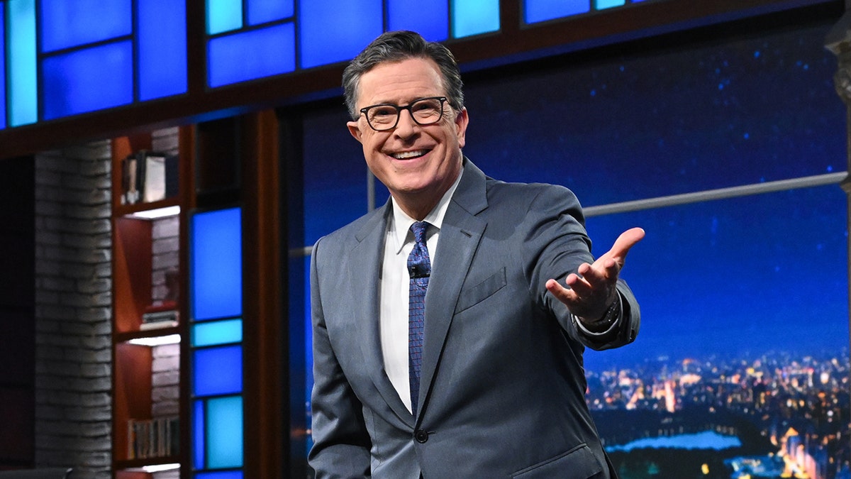 Stephen Colbert standing on stage during The Late Show with Stephen Colbert