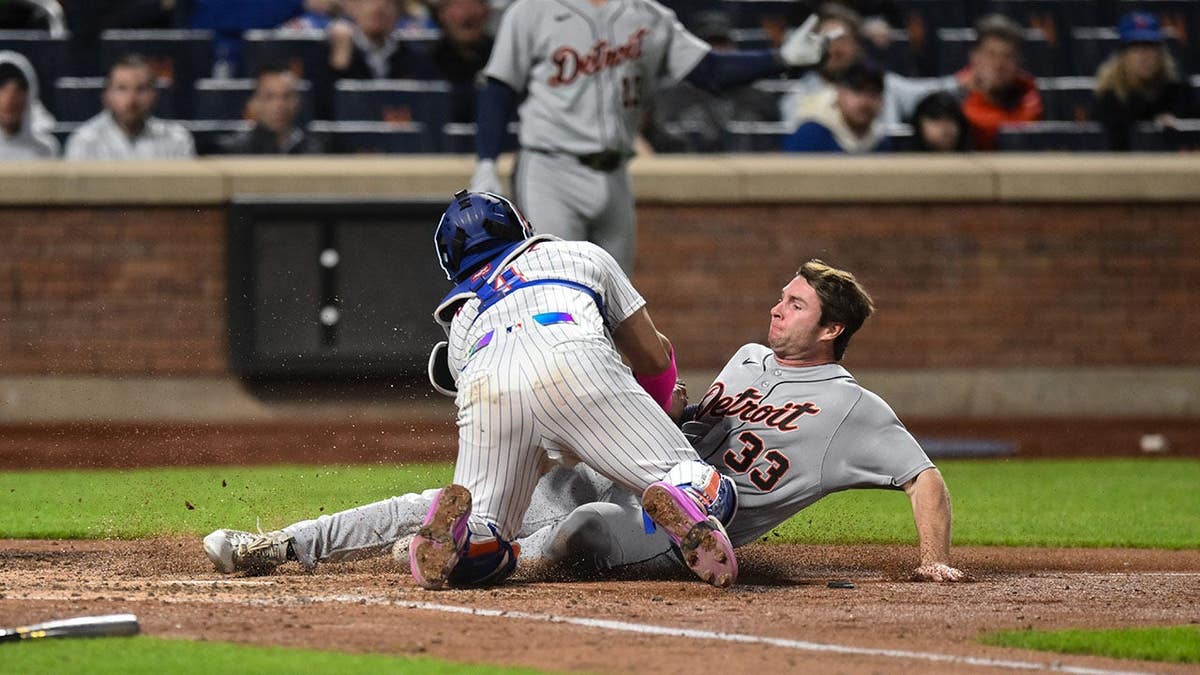 Detroit Tigers third baseman Colt Keith tagged out by New York Mets catcher Francisco Alvarez at Citi Field