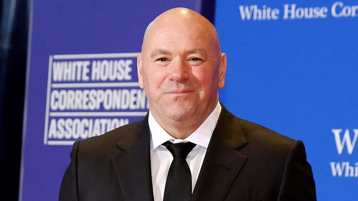 Dana White standing in a suit at the White House Correspondents' Dinner