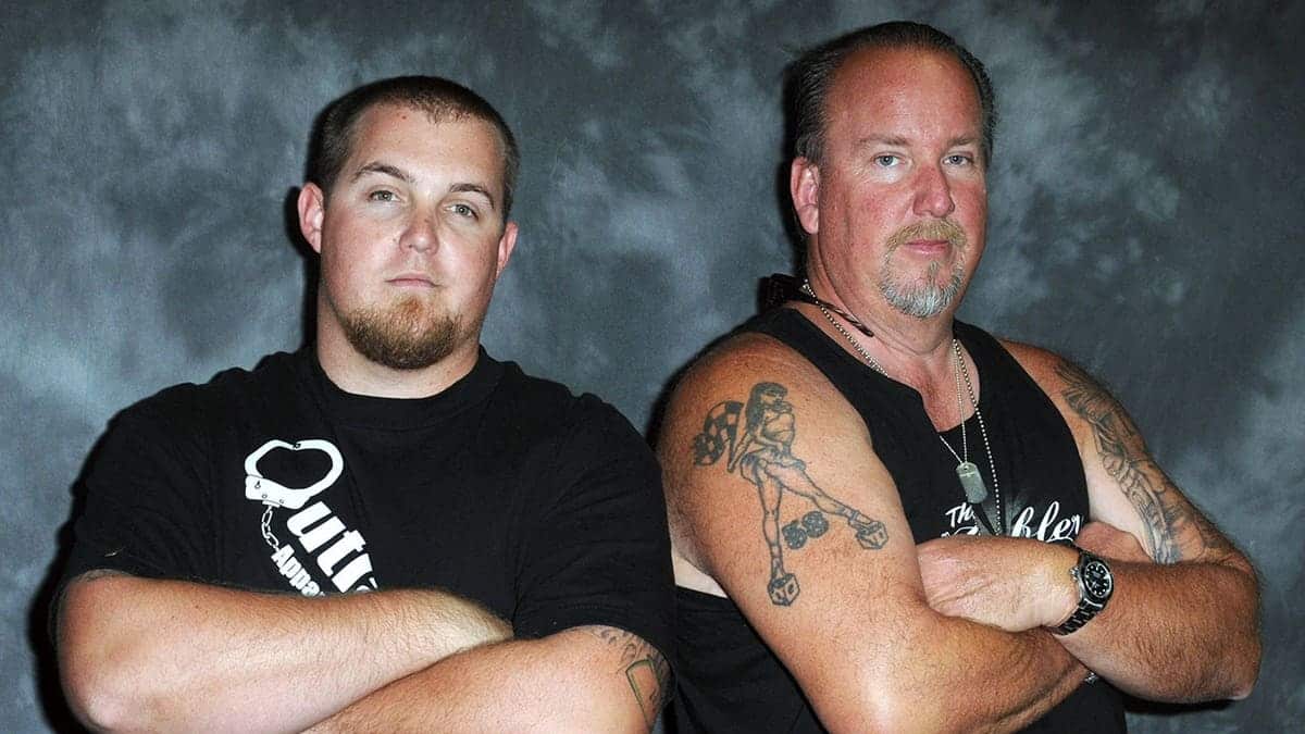 Brandon Sheets and Darrell Sheets pose for portraits.