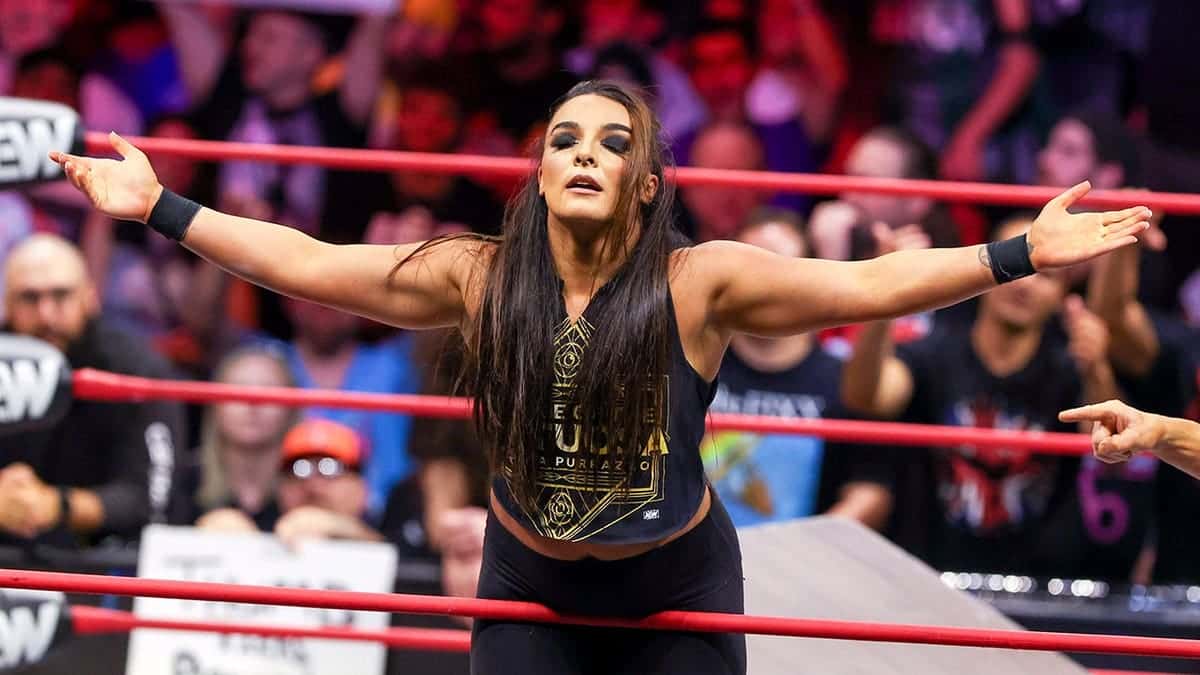 Deonna Purrazzo celebrating after winning a wrestling match at the Covelli Centre in Youngstown, Ohio