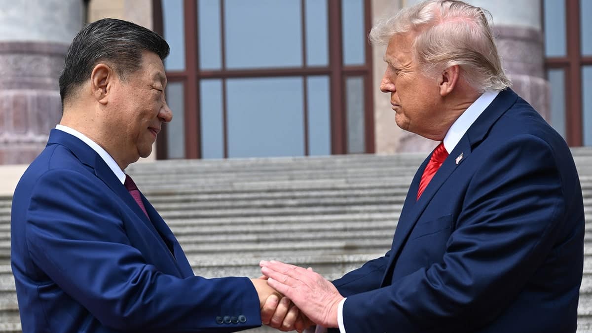 Chinese President Xi Jinping shaking hands with U.S. President Donald Trump at the Great Hall of the People in Beijing