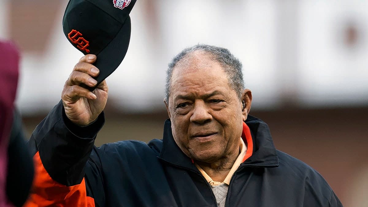 Hall of Famer Willie Mays tipping his cap during baseball game introductions