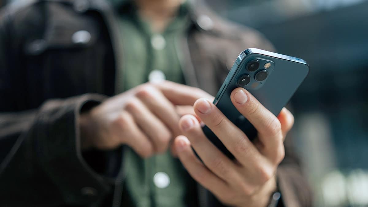 A person using an iPhone.