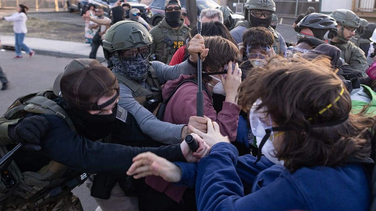 Federal immigration officers clashing with protesters outside Delaney Hall in Newark, New Jersey