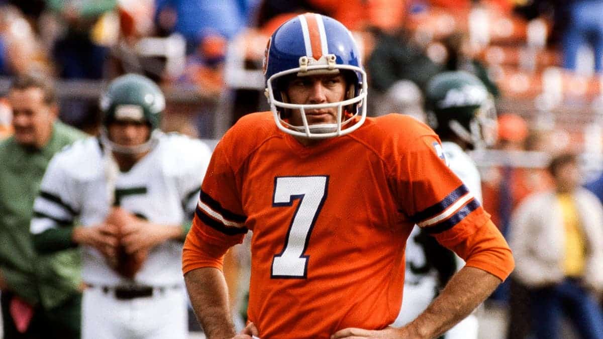 Denver Broncos quarterback Craig Morton standing on sidelines with hands on hips