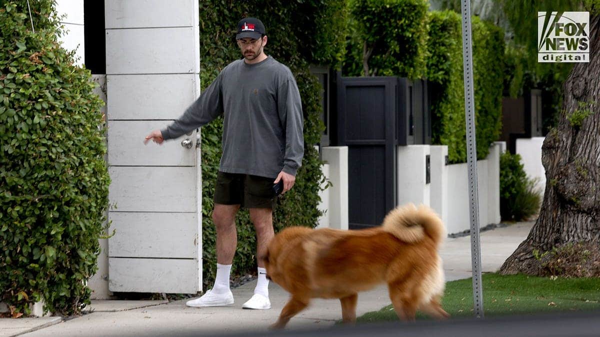 Hasan Piker standing outside his West Hollywood home