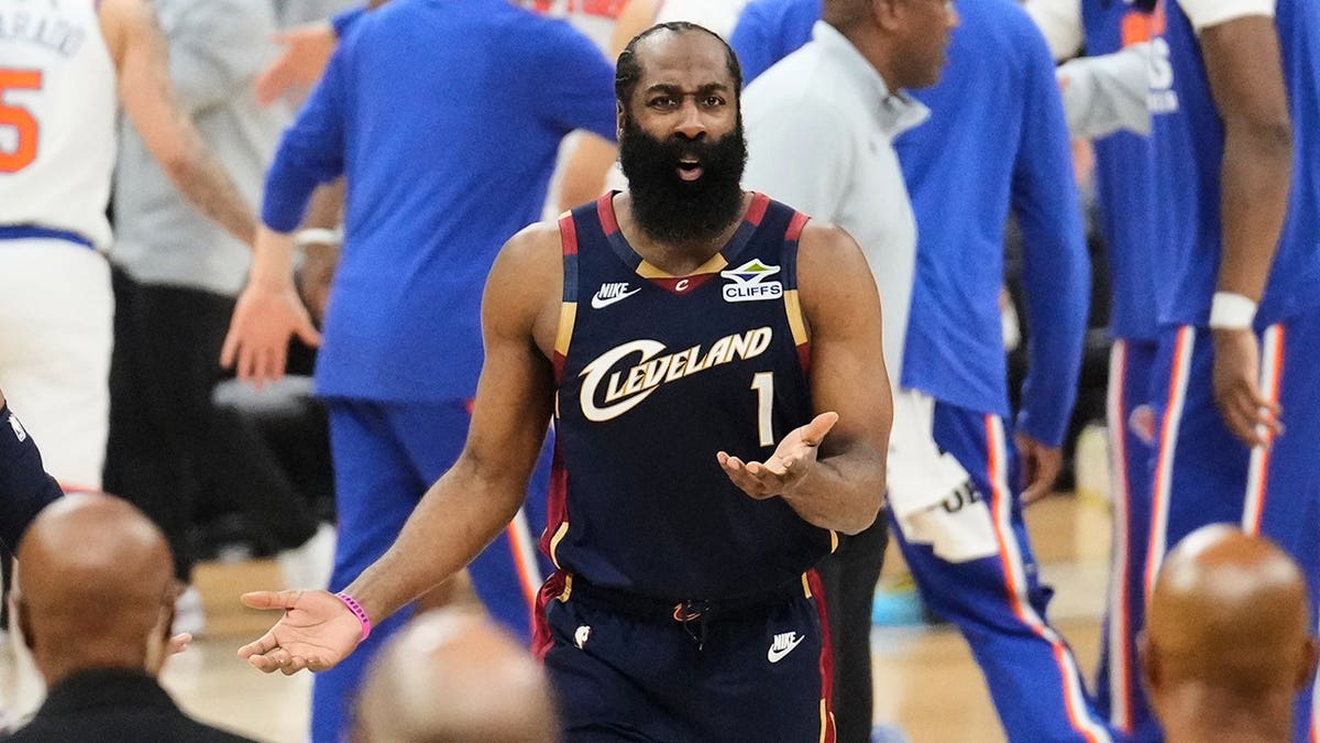 Cleveland Cavaliers guard James Harden reacting during a basketball game.