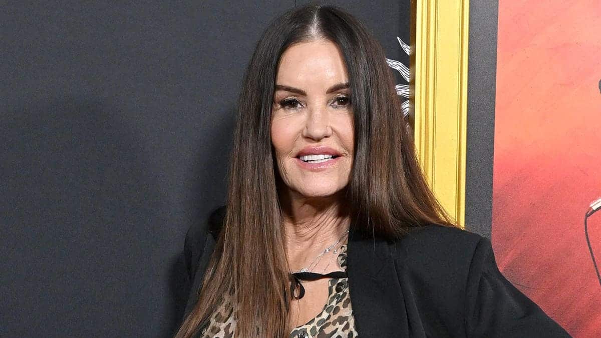 Janice Dickinson standing at the AFI Fest opening night gala premiere in Hollywood