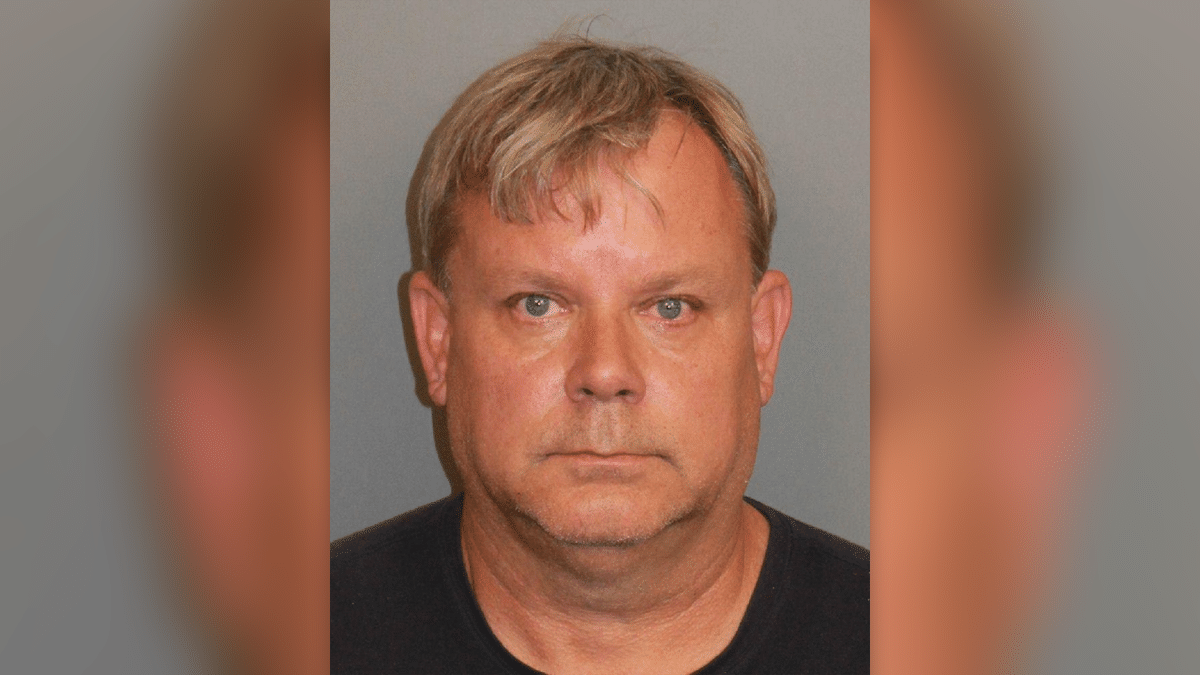 Jeffrey Towers wearing a black T-shirt in his Jefferson County mugshot