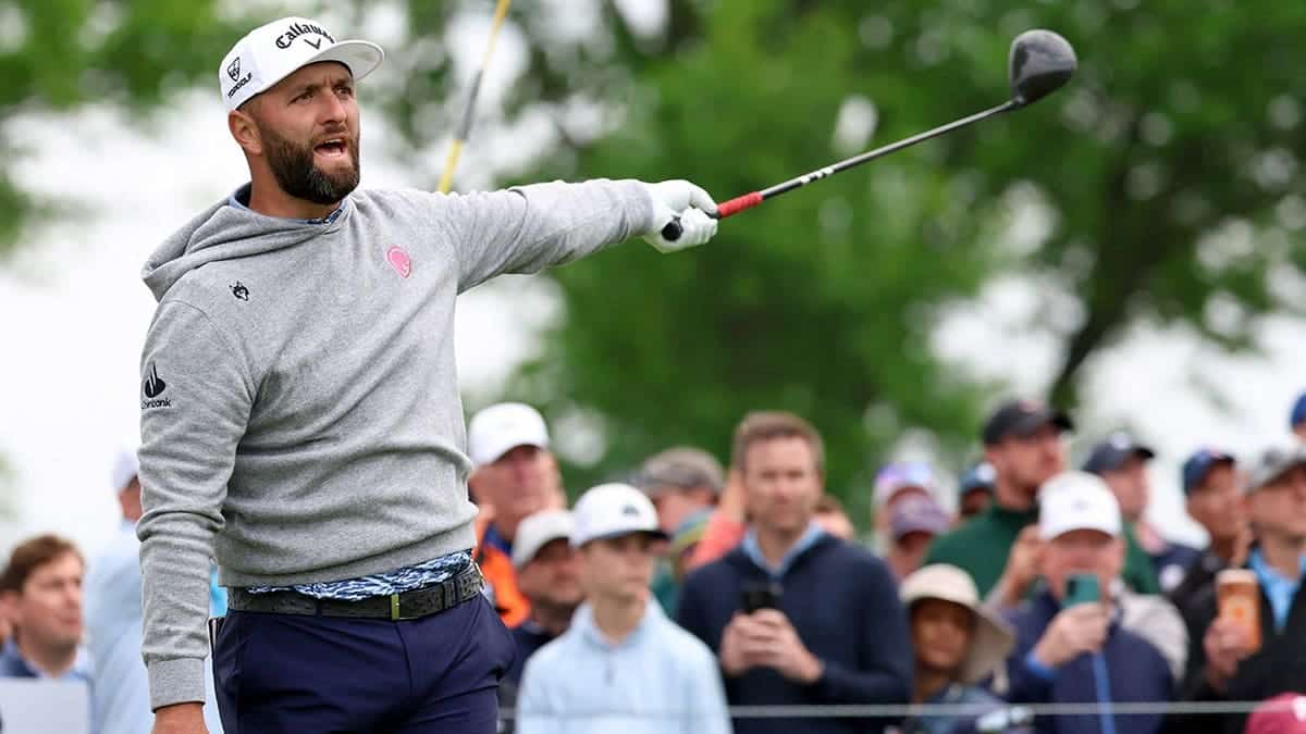 Jon Rahm reacting to his shot from the 12th tee at Aronimink Golf Club